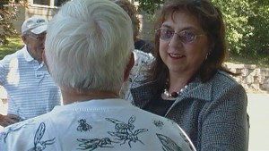 Summer Event Diana chats with a Maplewood Senior about protecting our parks and neighborhood preserves from sale.